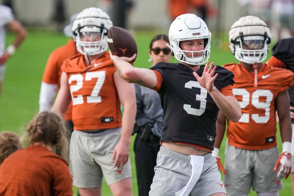 Texas quarterback Quinn Ewers throws the ball during spring practice at Texas' Denius Fields on Tuesday. The Longhorns' starting quarterback will reportedly throw passes during receiving drills at Texas' pro day on Wednesday.