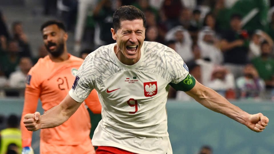 Lewandowski celebrates scoring his team's second goal during the Qatar 2022 World Cup Group C match against Saudi Arabia at the Education City Stadium in Al-Rayyan, west of Doha on November 26, 2022. - Andrej Isakovic/AFP/Getty Images