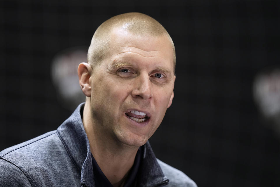 FILE - BYU coach Mark Pope speaks during the Big 12 men's college basketball media day Oct. 18, 2023, in Kansas City, Mo. Pope was negotiating with Kentucky to succeed John Calipari, multiple outlets reported Thursday night, April 11. Pope, who played for Kentucky's 1996 national championship team, was close to finalizing a deal, CBS Sports reported, citing anonymous sources. ESPN, also citing anonymous sources, also reported that an an agreement with Pope was expected. (AP Photo/Charlie Riedel, File)