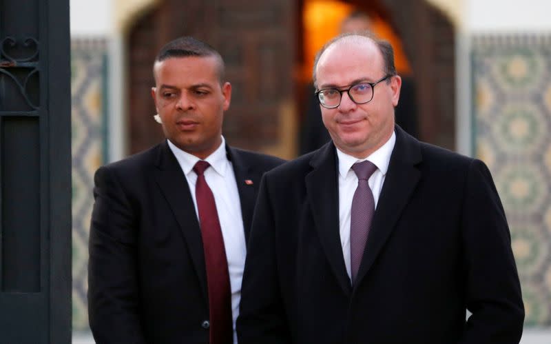 Tunisian Prime Minister Elyes Fakhfakh leaves for a meeting with Tunisian President Kais Saied in Tunis