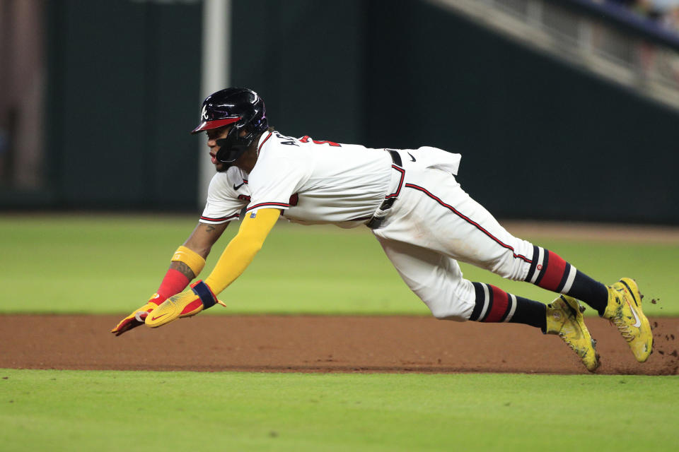 With bigger bases, limited pickoffs and a pitch timer, MLB hopes to increase the incentive for baserunners to attempt to steal in 2023. (Photo by Jeff Robinson/Icon Sportswire via Getty Images)