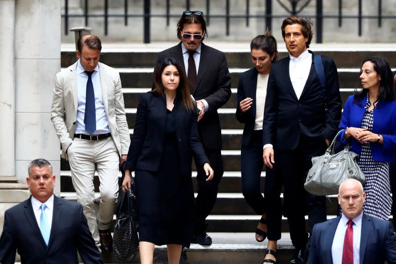 Actors Johnny Depp and Amber Heard at the High Court in London