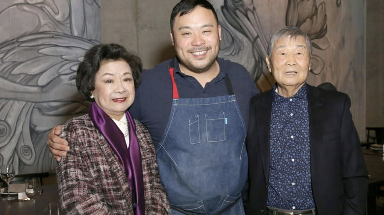 David Chang poses with his parents