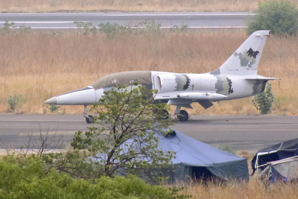 This photo released by Conflict Armament Research taken in Feb. 2017 is said by them to show an L-39 jet trainer/ground attack aircraft at the international airport in Juba, South Sudan. The Conflict Armament Research report released Thursday, Nov. 29, 2018, says Uganda diverted European weapons to South Sudan's military despite an EU arms embargo and asks how a U.S. military jet ended up deployed in South Sudan in possible violation of arms export controls.(Conflict Armament Research via AP)