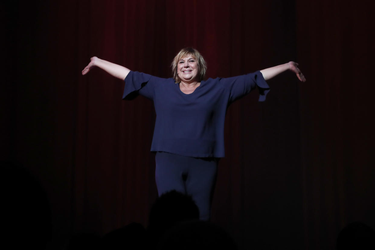 PARIS, FRANCE - JANUARY 28: Humorist Michele Bernier acknowledges the applause of the audience at the end of her One Woman Show 