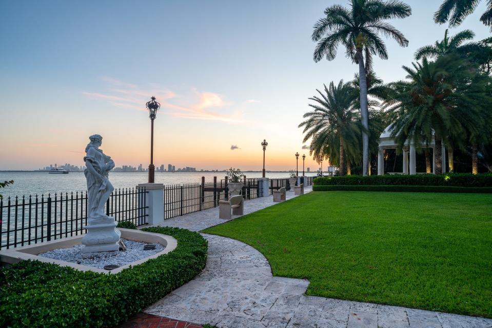 a statue on the lawn of the most expensive home currently for sale in Florida, 18 La Gorce Circle in Miami Beach