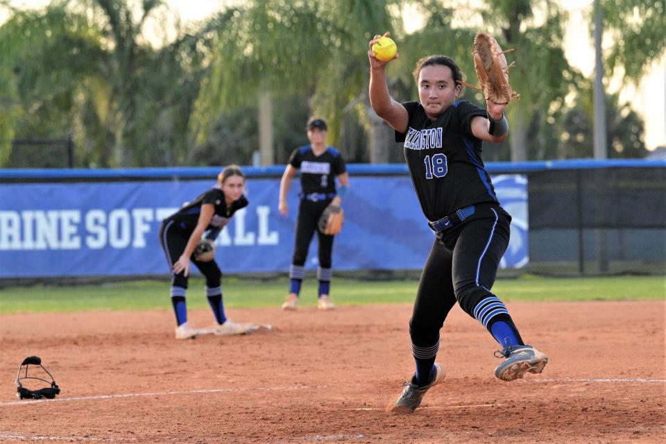 Wellington softball's Tori Payne fires a pitch during warm-ups in between innings during the Wolverines' regional semifinals contest against visiting Centennial (May 16, 2023).