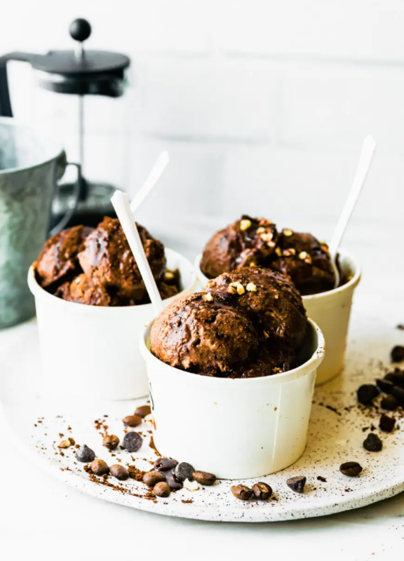 <p>Homemade dark chocolate sorbet spiked with espresso – an easy vegan sorbet recipe for chocolate lovers who need a boost of caffeine! Refined sugar-free.</p><p><strong>Get the Ninja Creami recipe: <a href="https://www.cottercrunch.com/espresso-dark-chocolate-sorbet/" rel="nofollow noopener" target="_blank" data-ylk="slk:Espresso Dark Chocolate Sorbet;elm:context_link;itc:0;sec:content-canvas" class="link ">Espresso Dark Chocolate Sorbet</a></strong></p>