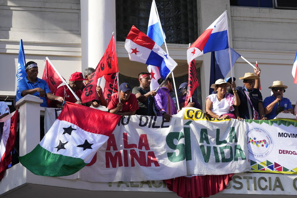 Protesters celebrate as they learn that Panama's Supreme Court has declared unconstitutional a 20-year concession for a Canadian copper mine that had sparked weeks of protests, in Panama City, Tuesday, Nov. 28, 2023. (AP Photo/Arnulfo Franco)