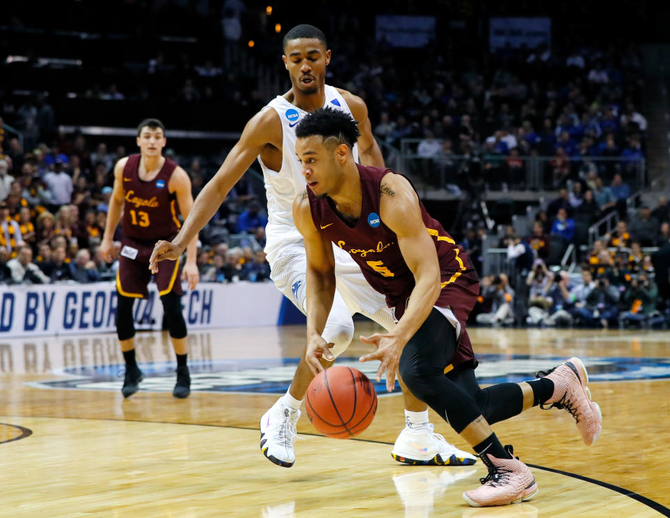 <p>Marques Townes #5 of the Loyola Ramblers drives to the basket against the Nevada Wolf Pack in the second half during the 2018 NCAA Men’s Basketball Tournament South Regional at Philips Arena on March 22, 2018 in Atlanta, Georgia. (Photo by Kevin C. Cox/Getty Images) </p>