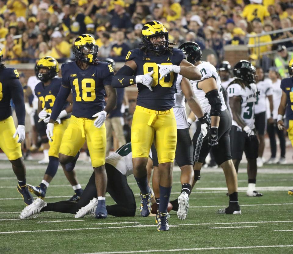 Michigan linebacker Mike Morris celebrates after sacking Hawaii quarterback Joey Yellen during the first half on Saturday, Sept. 10, 2022, in Ann Arbor.