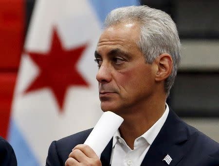 Chicago Mayor Rahm Emanuel listens to remarks from an attendee at a town hall meeting on the city budget in Chicago, Illinois, United States, August 31, 2015. REUTERS/Jim Young