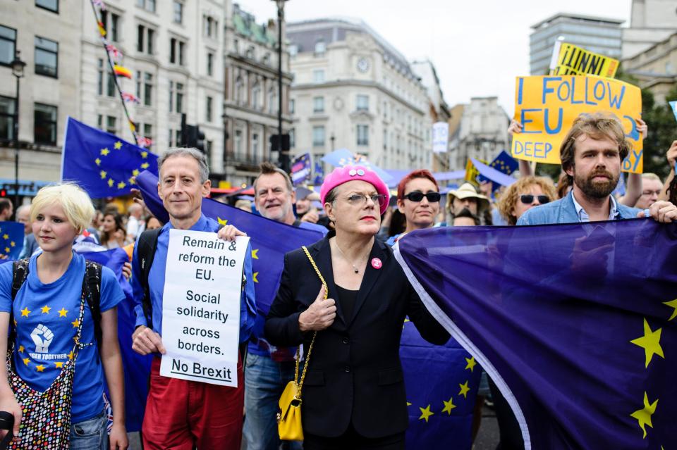 Comedian Eddie Izzard (centre), human rights campaigner Peter Tatchell (second left) and anti-Brexit activist Madeleina Kay (far left) lead the second pro-EU "March for Europe" through central London.