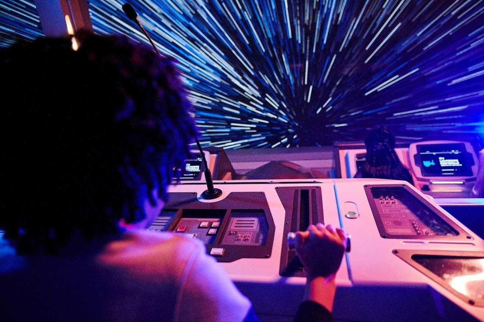 A child experiences the Galactic Starcruiser ride at Disney