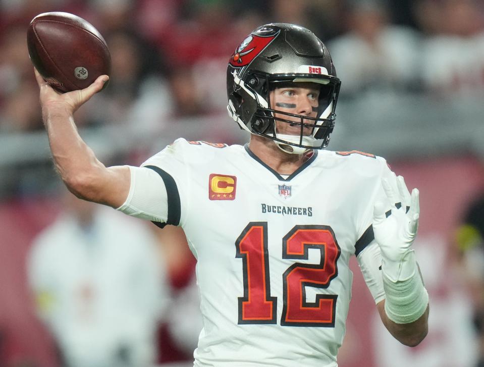 Tampa Bay Buccaneers quarterback Tom Brady (12) throws the ball against the Arizona Cardinals at State Farm Stadium in Glendale on Dec. 25, 2022.