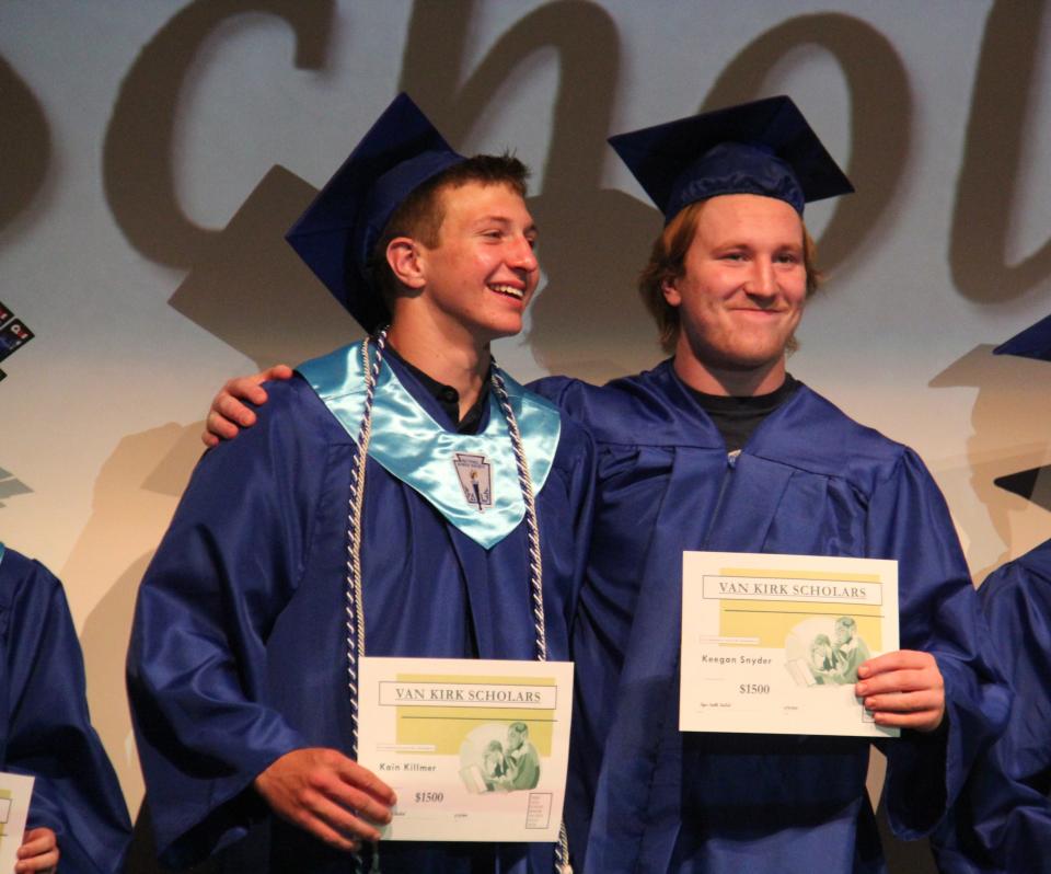 Kain Killmer and Keegan Snyder pose for a photo after receiving a Dallas "Pete" & Joyce (Conklin) VanKirk Scholarship during the Senior Awards Assembly on Wednesday, May 15, 2024, at Perry Performing Arts Center.