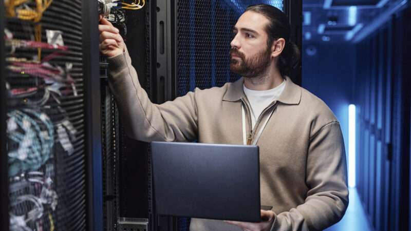 Tech worker in the computer server room