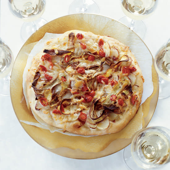 Squash and Potato Pizzas Slices of summer’s last squash and fall’s first potatoes drizzled with a peppery Tuscan-style olive oil make an incredible topping for this thin-crust pizza. Get the Squash and Potato Pizza recipe.