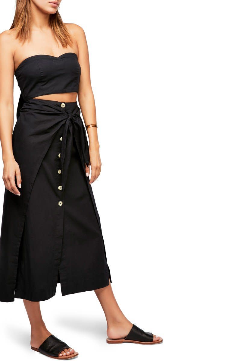 Get the matching set <a href="https://shop.nordstrom.com/s/free-people-sunny-sun-top-skirt/4961282?origin=keywordsearch-personalizedsort&amp;color=black" target="_blank">here</a>.