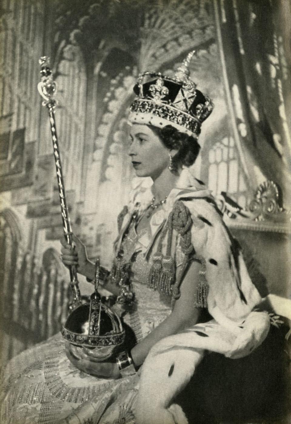 queen elizabeth ii with crown, orb and sceptre, 2 june 1953, 1962 coronation portrait the queen wears the imperial state crown, made in 1937 for the coronation of her father george vi, and holds the sovereigns sceptre with cross, and the sovereigns orb, both dating from 1661 the crown, orb and sceptre are part of the royal collection at the tower of london from the crown jewels in the tower of london, by martin holmes, fsa her majestys stationery, london, 1962 creator unknown photo by the print collectorheritage images via getty images