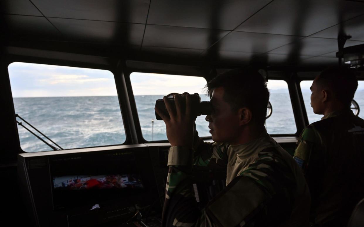 Indonesian Navy ship KRI Torani (860) monitoring conditions after the major tsunami which hit 22 December - AFP