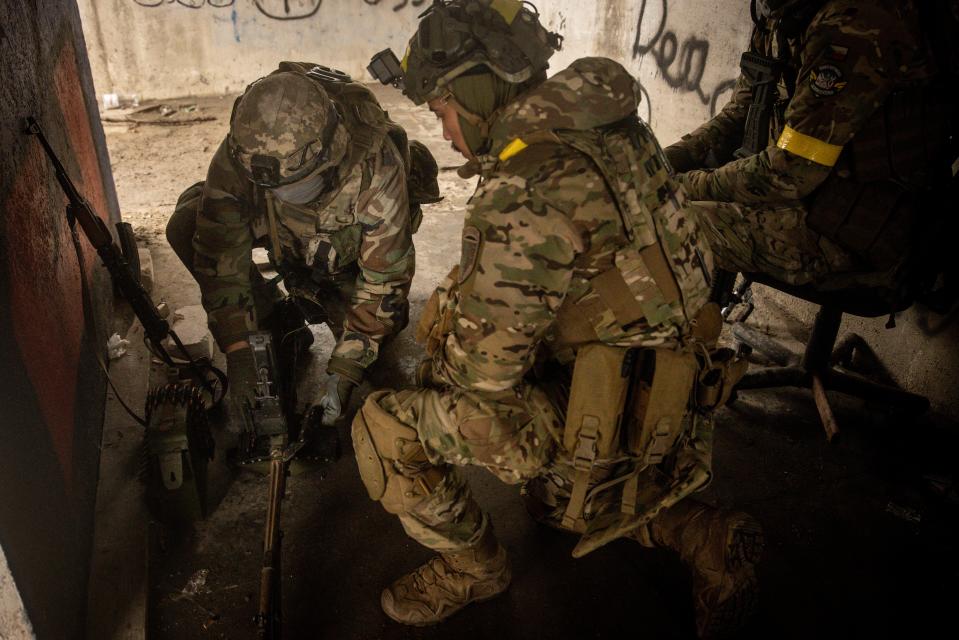 Members of the foreign legion prepare equipment ahead of an operation targeting a Russian position on the west bank of the Dnipro River in Kherson Oblast, Ukraine (Getty Images)