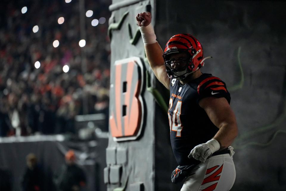 Cincinnati Bengals center Ted Karras (64) takes the field for introductions in the first quarter during an NFL wild-card playoff football game between the Baltimore Ravens and the Cincinnati Bengals, Sunday, Jan. 15, 2023, at Paycor Stadium in Cincinnati.The Ravens led 10-9 at halftime.