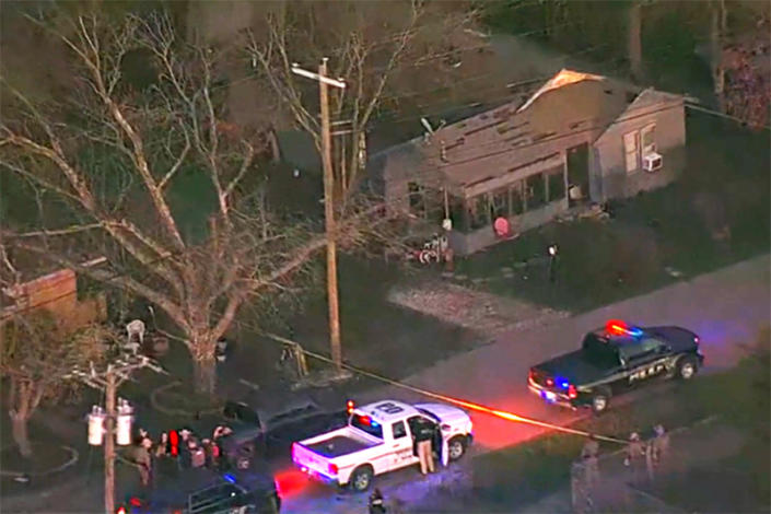 Authorities investigate the scene where three children were found dead and two others were injured inside a home in the Ellis County city of Italy, Texas, on March 3. (NBC DFW)