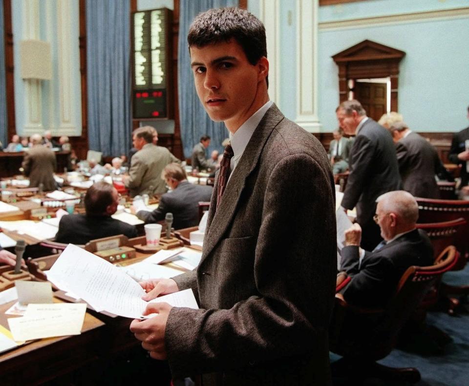 James Earl Carter IV, the 20-year-old grandson and namesake of former President Jimmy Carter, works on the floor of the Georgia House Thursday, Jan. 29, 1998 in Atlanta. James is the son of Carter's middle son, Chip. As a legislative assistant for the Department of Human Resources, James Carter twice a day collects bills which potentially impact the agency and helps monitor meetings of legislative committees. (AP Photo/Wilford Harewood)