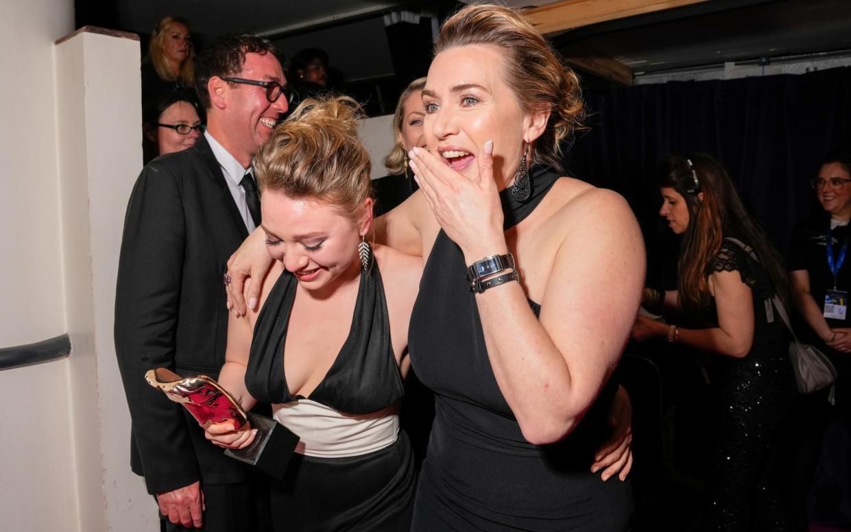 Kate Winslet who won the single drama award for I Am Ruth celebrates with her daughter and co-star Mia Threapleton - Scott Garfitt/BAFTA