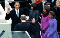 <p>President Barack Obama (L) is sworn in by Supreme Court Justice John Roberts, as first lady Michelle Obama and her daughters, Sasha (R) and Malia, look on during inauguration ceremonies in Washington, January 21, 2013. (Kevin Lamarque/Reuters) </p>