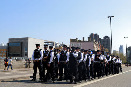 Police officers are seen during the Extinction Rebellion protest on Waterloo Bridge in London, Britain April 20, 2019. REUTERS/Simon Dawson