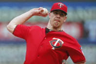 FILE - In this June 27, 2019, file photo, Minnesota Twins relief pitcher Trevor May throws against the Tampa Bay Rays during a baseball game in Minneapolis. Trevor May has been preparing for this. Not precisely for a global pandemic that would bring sports — and so much else — to an unprecedented standstill. But a break in the baseball schedule? That's something the Minnesota Twins reliever — and pro video game streamer — thought might happen eventually. (AP Photo/Jim Mone, File)