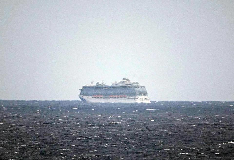 The Regal Princess Cruise ship is seen about 5 miles off the coast of Fort Lauderdale, Fla., Sunday, March 8, 2020. The cruise ship was being held off the coast waiting for COVID-19 test results for two crew members, who later tested negative.