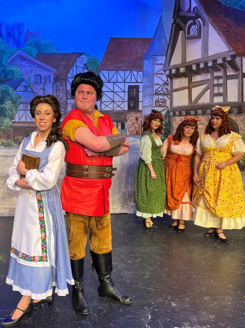 The cast of Falmouth Theatre Guild&#39;s production of &quot;Disney&#39;s Beauty and the Beast&quot; musical incudes, from left, Meghan Richardson as Belle; Bobby Price as Gaston&#39; and Cheri Prescott, Victoria Santos and Lori Lawson as &quot;Silly Girls.&quot;