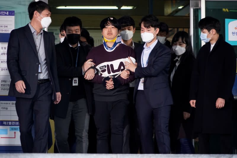 Cho Ju-bin, leader of South Korea's online sexual blackmail ring which is so called 'Nth room', walks out of a police station as he is transferred to a prosecutor's office in Seoul