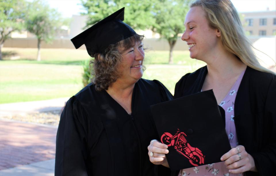 Mandy Roberson, right, laughs with her mother Thursday before being interviewed by McMurry staff ahead of their graduation Saturday.