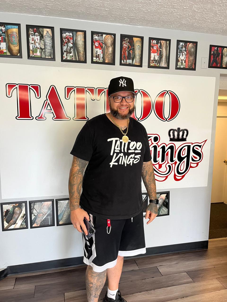 T King, owner of Tattoo Kings on Morse Road, is the artist of choice for more than a dozen Ohio State football players.
