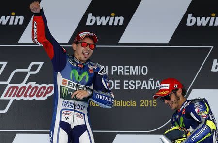 Yamaha MotoGP rider Jorge Lorenzo (L) of Spain celebrates next to Valentino Rossi of Italy after winning the Spanish Grand Prix in Jerez de la Frontera, southern Spain, May 3, 2015. REUTERS/Marcelo del Pozo