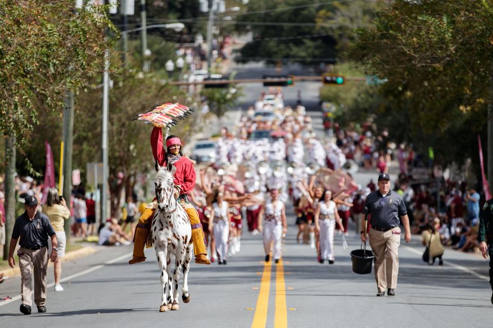 Florida State fans gather on campus to celebrate the Seminoles with the annual homecoming parade Friday, Oct. 22, 2021.