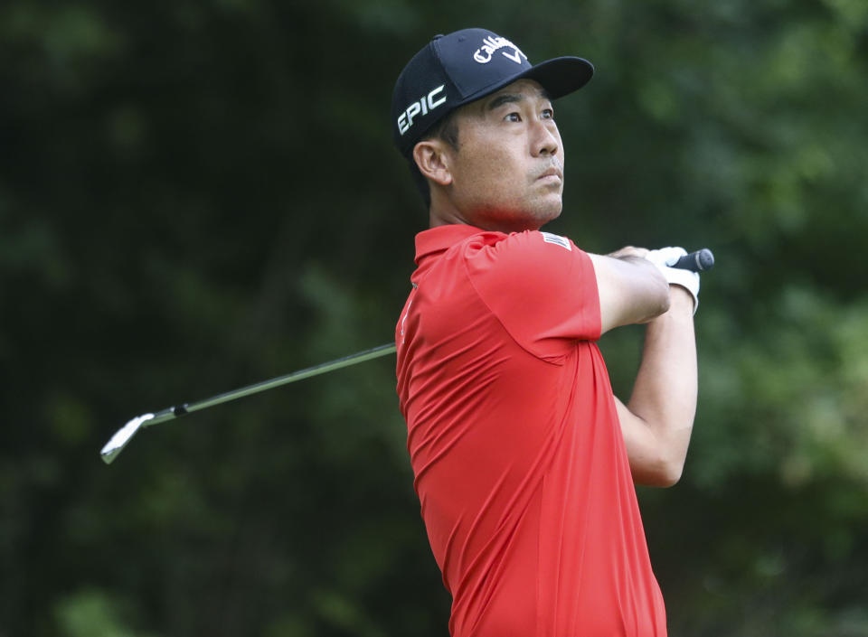 Kevin Na tees watches his tee shot on the 16th hole during the first round of the John Deere Classic golf tournament Thursday, July 8, 2021, in Silvis, Ill. (Jessica Gallahger/The Dispatch – The Rock Island Argus via AP)