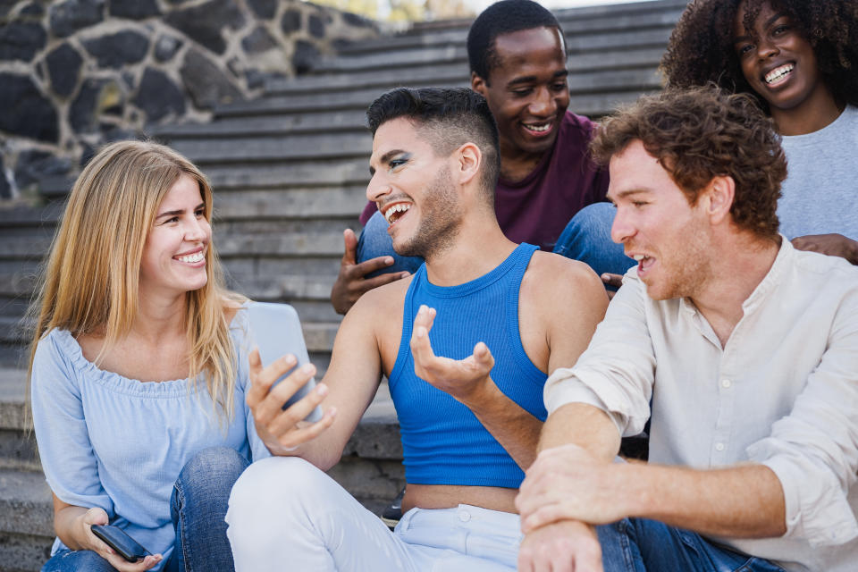 Social media can sometimes be dangerous for queer and trans people, since it strips away context. (Photo via Getty Images)