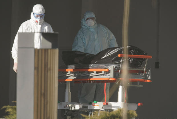 Medical specialists push a stretcher in a hospital for patients infected with the coronavirus disease on the outskirts of Moscow 