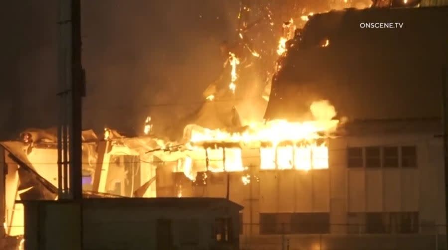 A second flare-up reignites at a historic WWII-era hangar in Tustin on Nov. 14, 2023. (OnScene.TV)
