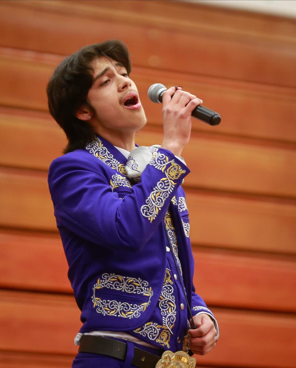 Denison High School senior Brian Ibarra sings.