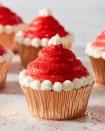 <p>Bake off your favorite <a href="https://www.delish.com/cooking/recipe-ideas/g2890/easy-cupcake-recipes/" rel="nofollow noopener" target="_blank" data-ylk="slk:cupcakes;elm:context_link;itc:0;sec:content-canvas" class="link ">cupcakes</a>, pipe a tall swirling mound of red frosting on top, then add a little white around the edges and top. You'll have the cutest Christmas dessert in no time, and everyone will be obsessed. </p><p>Get the <strong><a href="https://www.delish.com/cooking/recipe-ideas/recipes/a50541/santa-hat-cupcakes-recipe/" rel="nofollow noopener" target="_blank" data-ylk="slk:Santa Hat Cupcakes recipe;elm:context_link;itc:0;sec:content-canvas" class="link ">Santa Hat Cupcakes recipe</a></strong>.</p>