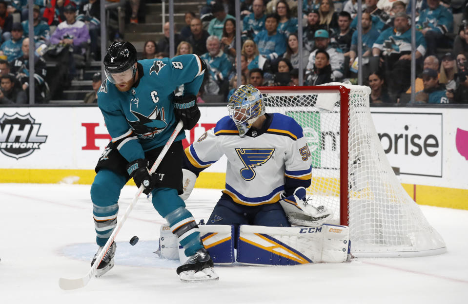 St. Louis Blues goaltender Jordan Binnington (50) makes a save against San Jose Sharks' Joe Pavelski (8) in the first period in Game 5 of the NHL hockey Stanley Cup Western Conference finals in San Jose, Calif., on Sunday, May 19, 2019. (AP Photo/Josie Lepe)
