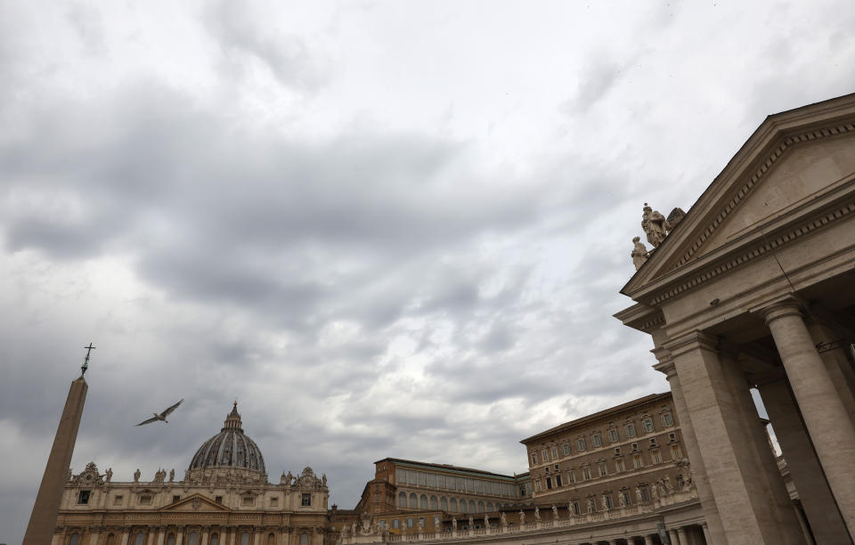 The sky above St. Peter's Square at the Vatican, is overcast, on Tuesday, July 27, 2021. A trial is slated to begin on Tuesday within the Vatican City’s imposing walls of 10 defendants, including a once-powerful cardinal, in a case based on a sprawling probe into the allegedly criminal management of the Holy See’s portfolio of assets, including donations by countless Catholics from the pews. (AP Photo/Riccardo De Luca)