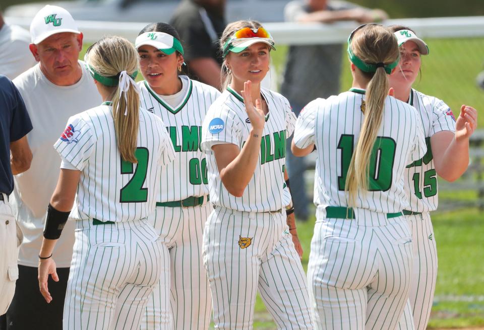 Wilmington players congratulate each other after the Wildcats' 2-1 win against Pace in their opening game of the NCAA Division II regional tournament at Wilmington University Thursday, May 11, 2023. The Wildcats meet Georgian Court in the winners bracket Friday at 10a.m. at Asbury Field.