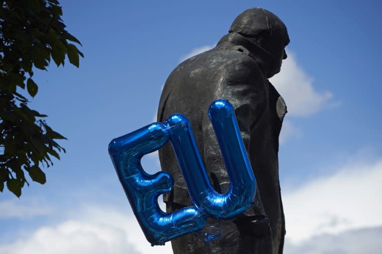 An EU balloon is attached to the Winston Churchill statue in Parliament Square as thousands of protesters take part in a March for Europe, through the centre of London on July 2, 2016